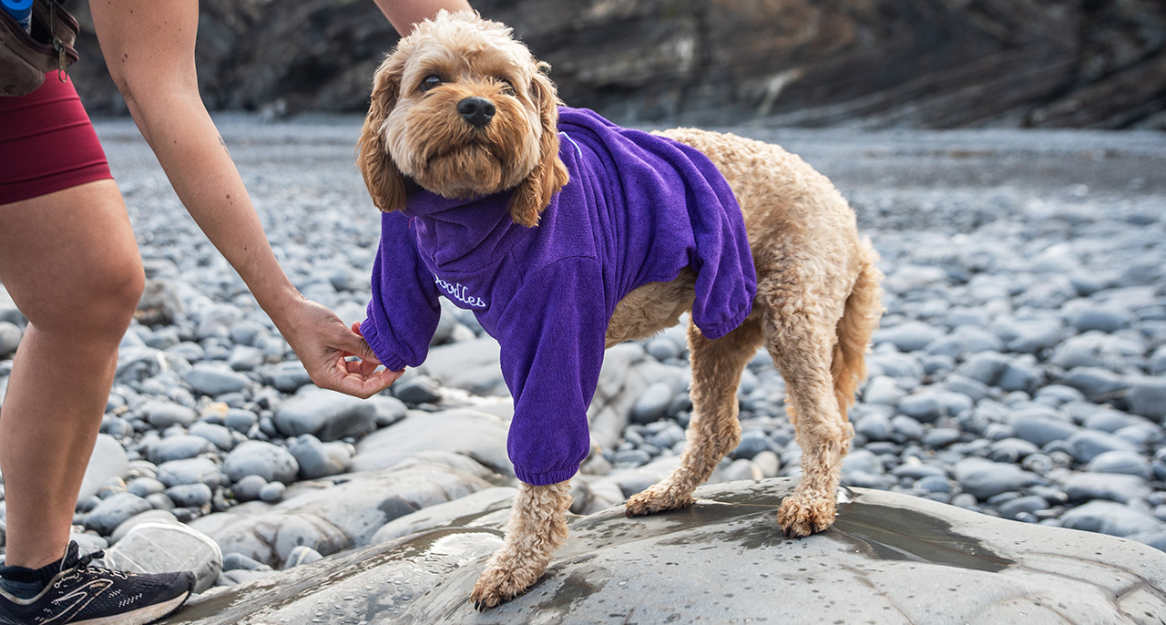 Drying Robe being put on at the beach